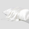 Dark grey mulberry silk pillowcase with envelope closure showing smooth texture and modern simplicity design