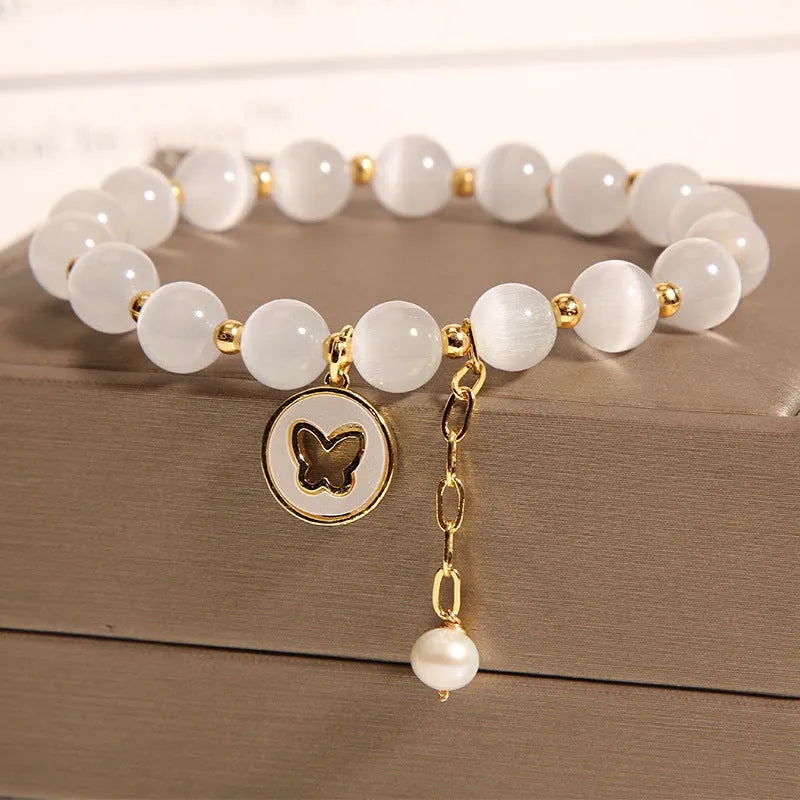 White geometric crystal cat's eye bracelet with adjustable closure in Korean health care style