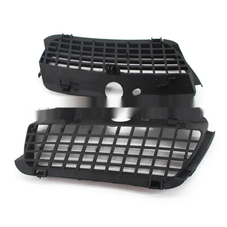 Pair of black ABS plastic Volkswagen Golf 3 front bumper fog light covers.