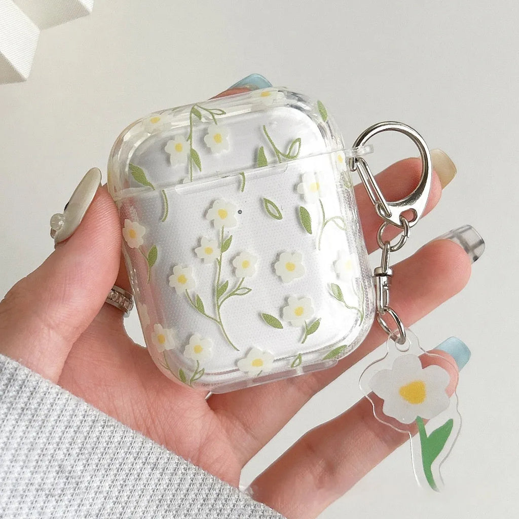 White floral design AirPods protective cover showing high-transparency TPU material and decorative elements