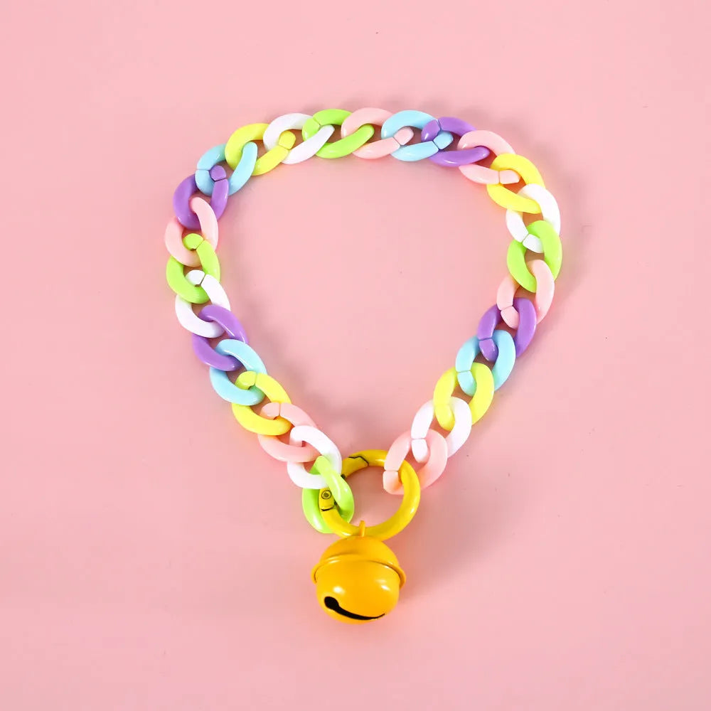 Adjustable pet collar in macaron candy colours with plastic construction and monochrome pattern