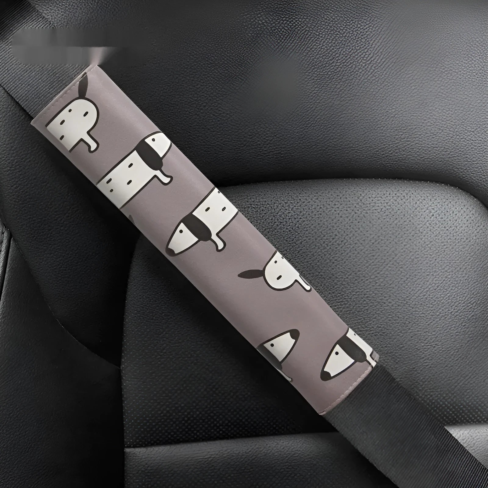PU leather car seat belt shoulder pad with Dachshund cartoon design, 14cm by 22cm.