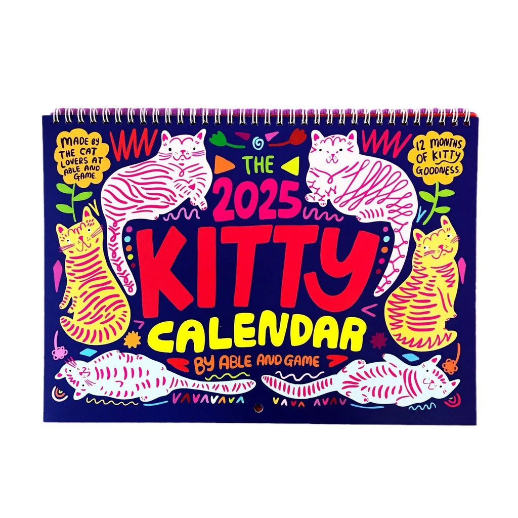 Cat-themed wall calendar showing 12-month grid with tear-off design and feline illustrations for each month
