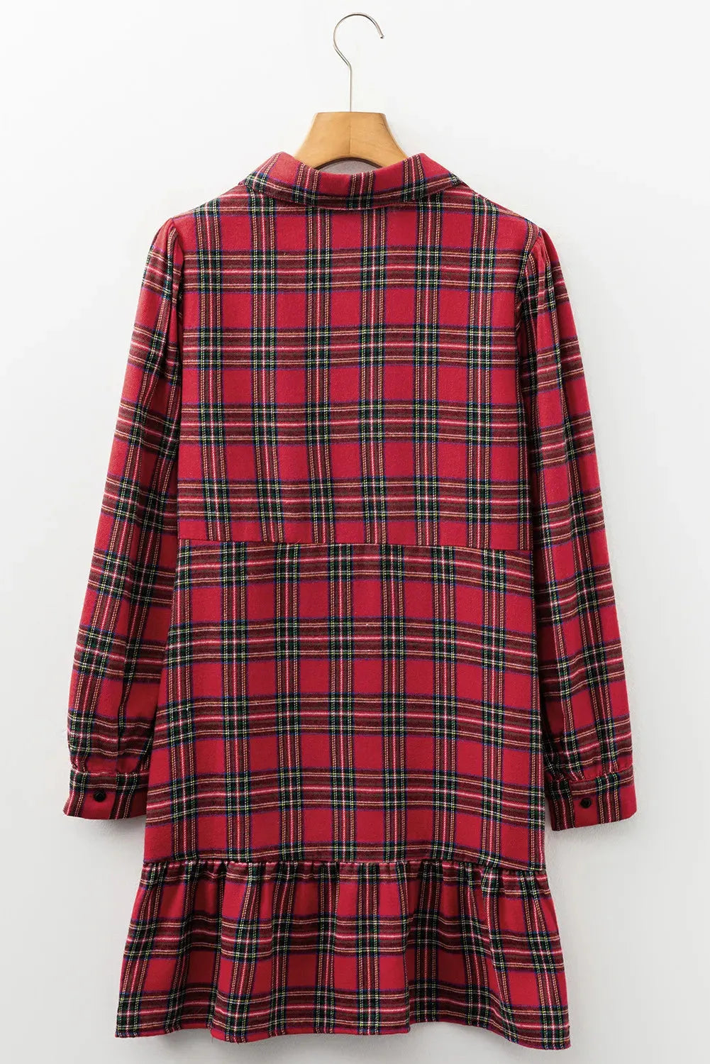 Red and black plaid mini dress with a shirt collar, half-button front, long sleeves, and a ruffle hem.