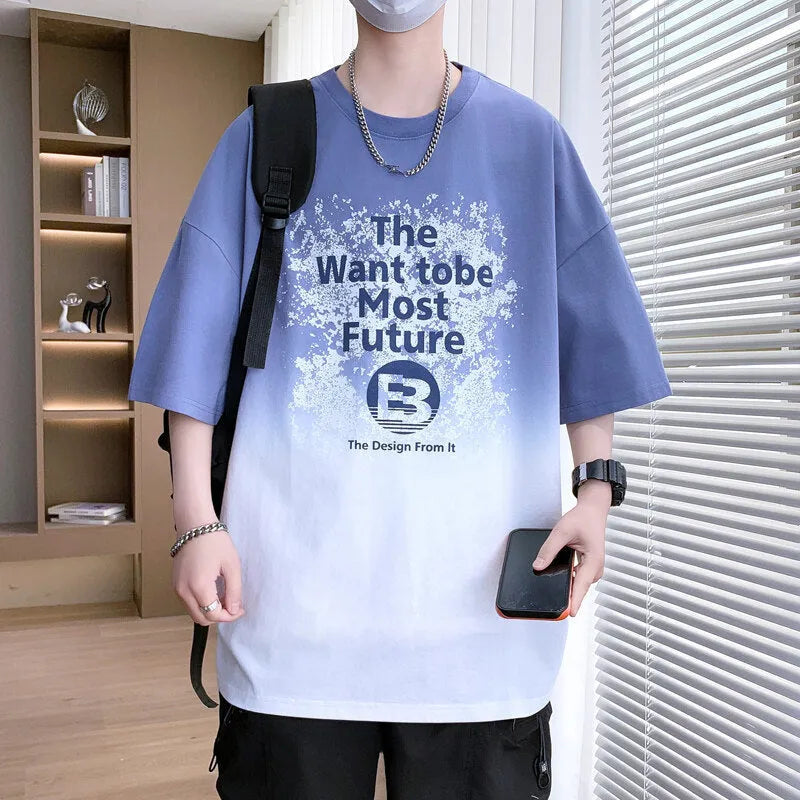A dark blue boys' printed t-shirt with jacquard text pattern and drop shoulder sleeves.
