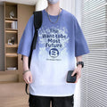 A dark blue boys' printed t-shirt with jacquard text pattern and drop shoulder sleeves.
