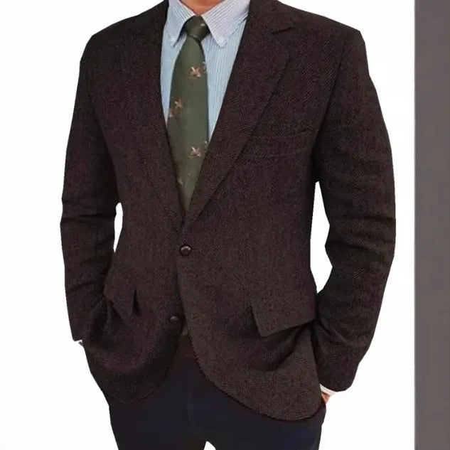 Men's brown herringbone retro suit jacket with long sleeves on a hanger.