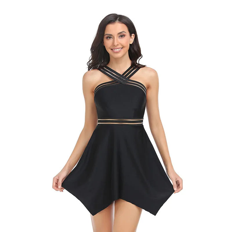Women's black one-piece swimsuit with a sheer tulle skirt and high-leg split.
