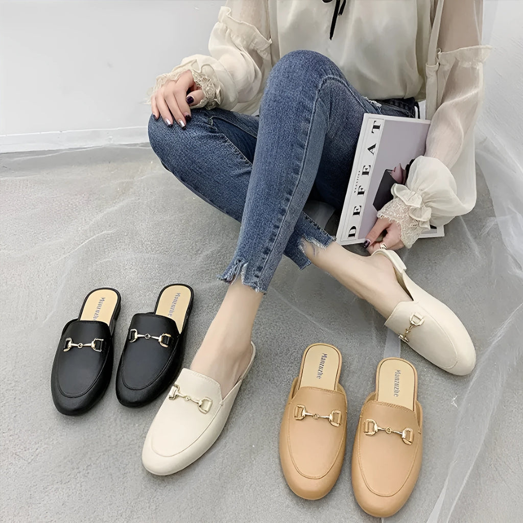 Women's PVC closed-toe slippers with buckle fastening in black, brown or white colours