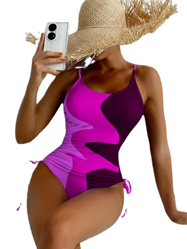 One-piece swimsuit in blue colour with sleeveless design and fixed swimming trunks for female swimming sports
