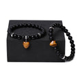 Matching natural stone couple bracelets with polished gemstone heart pendants