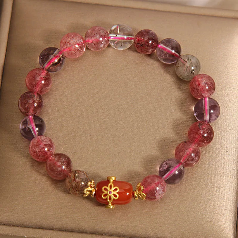 Super Seven crystal bracelet with white crystal and red agate accents on adjustable chain