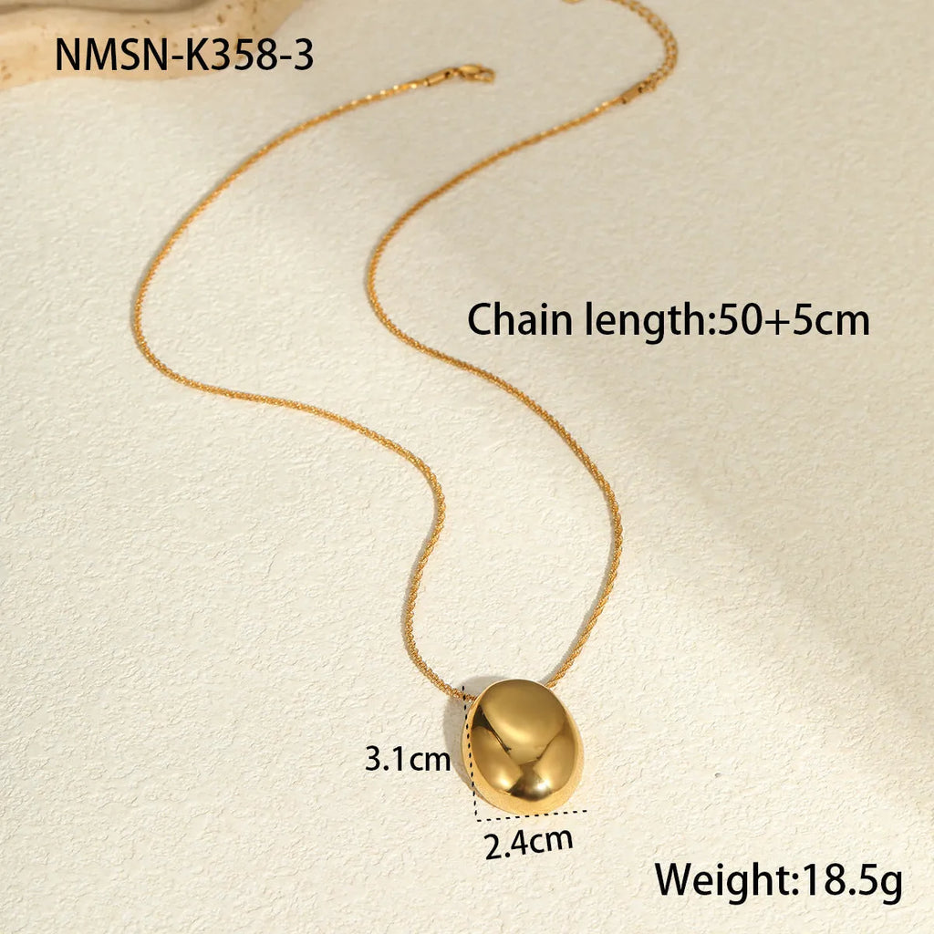 Long gold-plated necklace featuring a geometric pendant on an adjustable stainless steel chain.