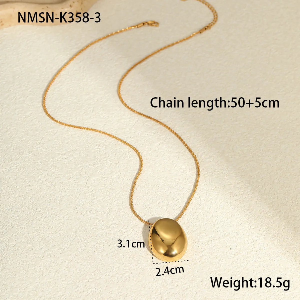 Long gold-plated necklace featuring a geometric pendant on an adjustable stainless steel chain.