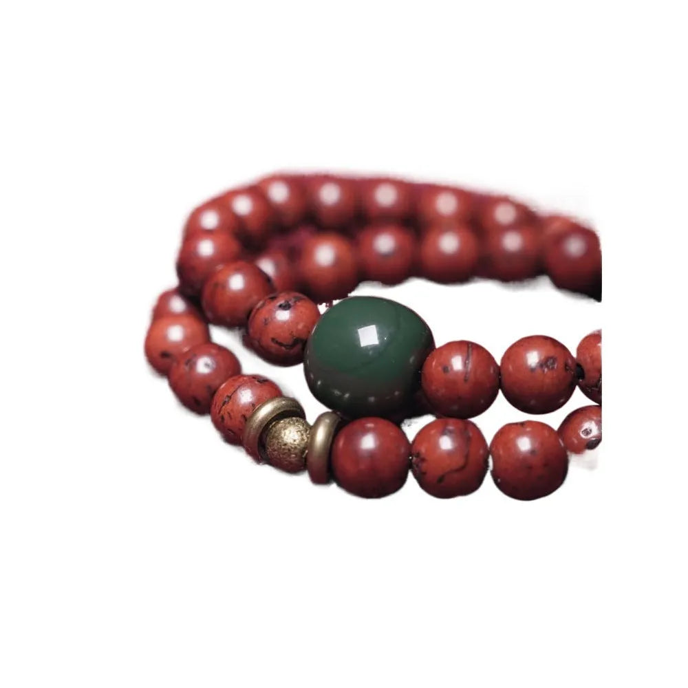 Bird's eye bodhi double circle bracelet showing hand-processed natural seeds in retro cartoon style