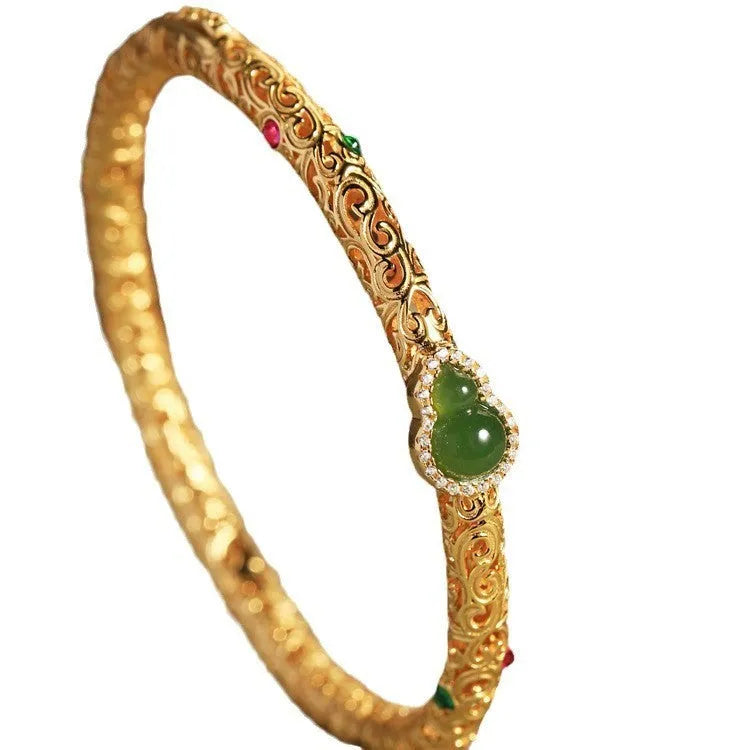 Women's gold-plated bracelet with xiangyun gourd charm and retro opening clasp on copper construction