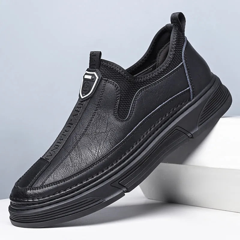 Men's solid colour leather casual shoes with round toe in black and brown colour options.