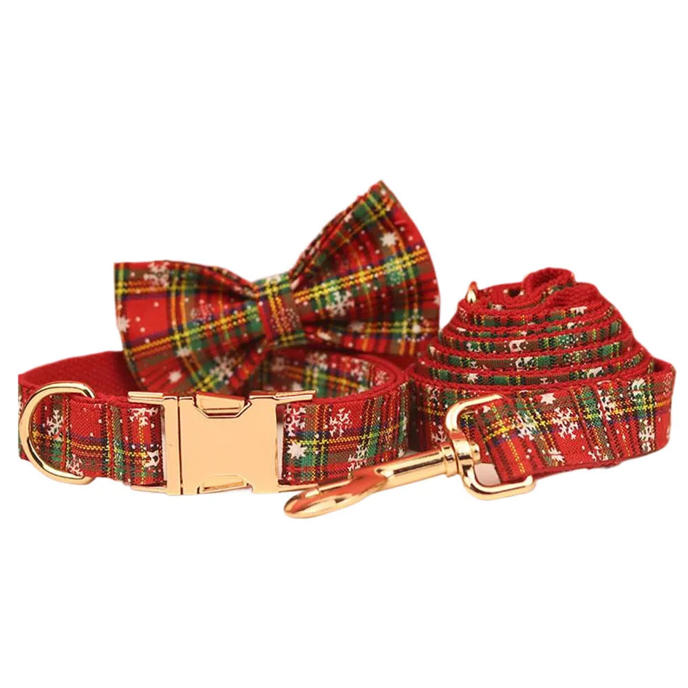 Red Christmas dog collar and leash set with snowflake patterns, plaid leash, vest, and bow tie