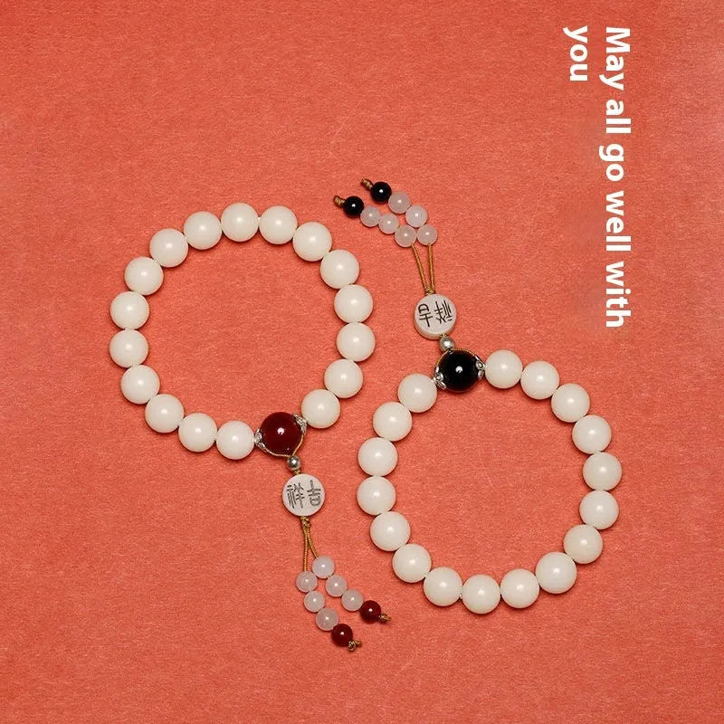 White Jade Bodhi bracelet with 10mm beads in three colour options showing manual processing details