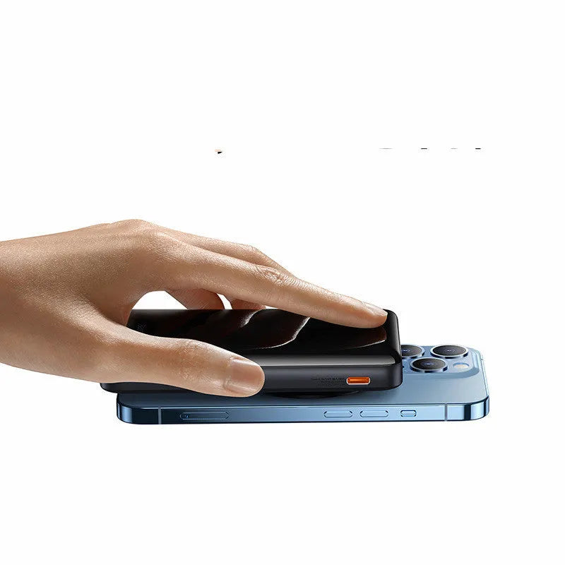 Slim blue magnetic 3-in-1 wireless power bank next to a charging cable.