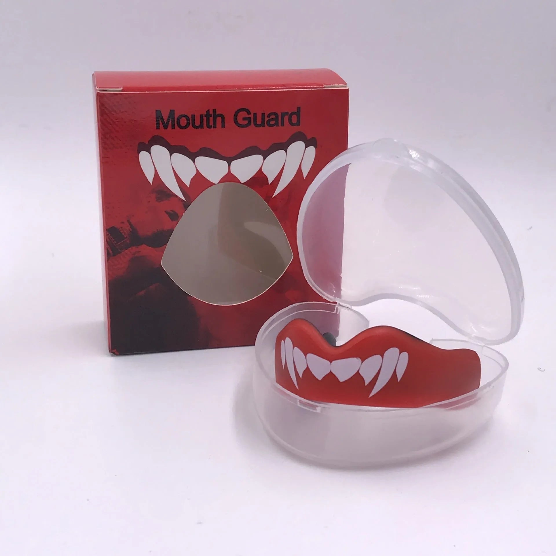 Adult boxing mouthguard with tooth socket design in black/white colour variant showing printed teeth pattern