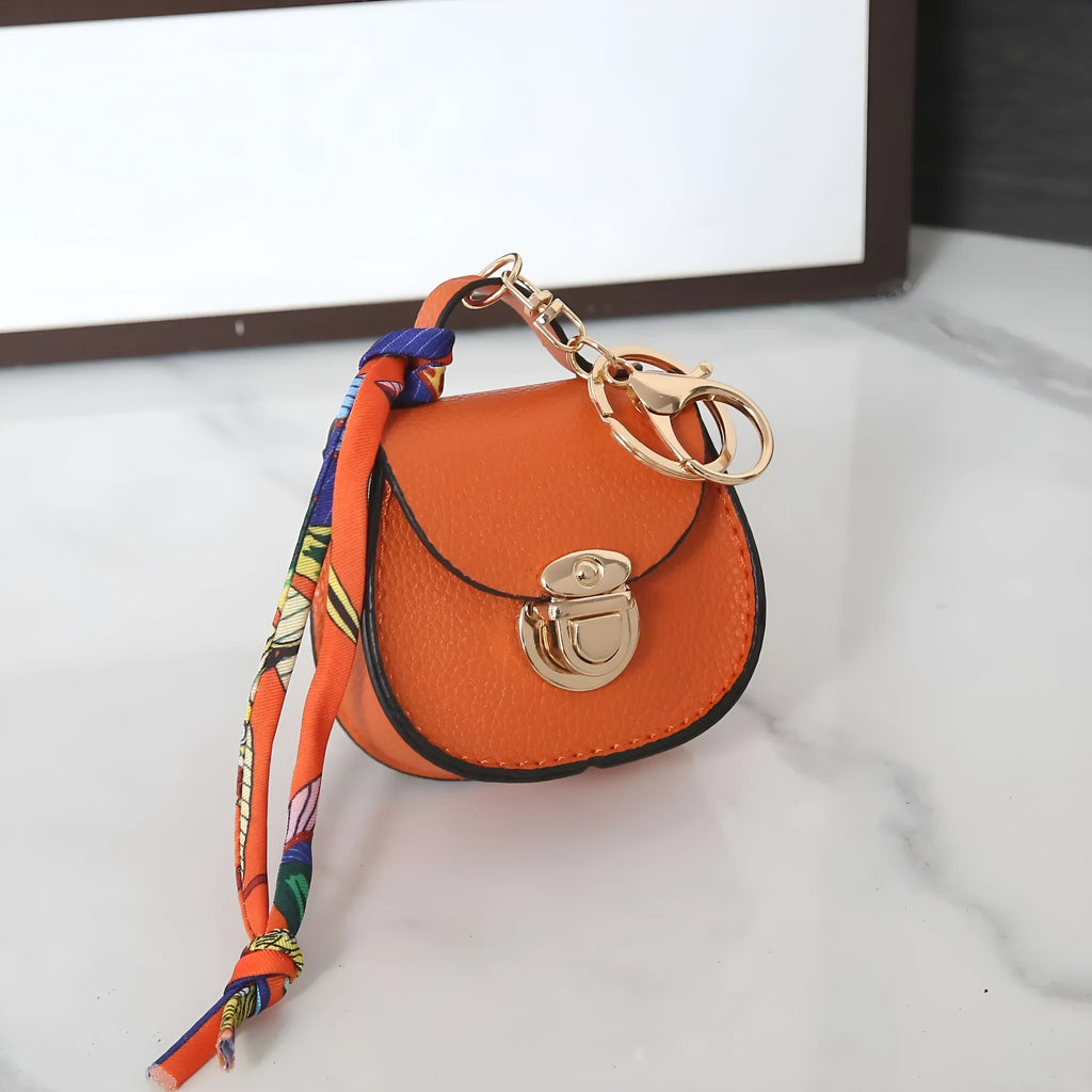 Solid colour PVC coin purse with keychain attachment in multiple colour options