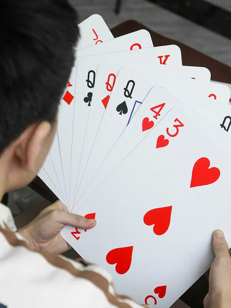 Oversized playing cards showing four, six, and nine times size options compared to standard cards