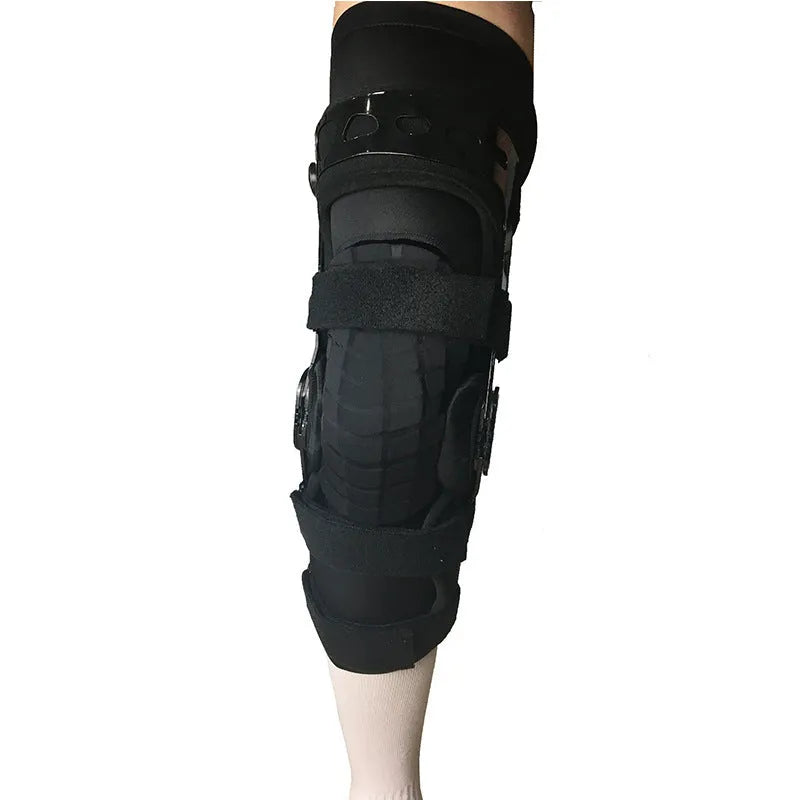 Black anterior ligament knee pad with adjustable straps, showing brushed cloth interior and sandwich fabric construction