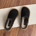 Milky white linen slip-on shoes with mesh lining, round toe, and a light rubber sole on a neutral background.