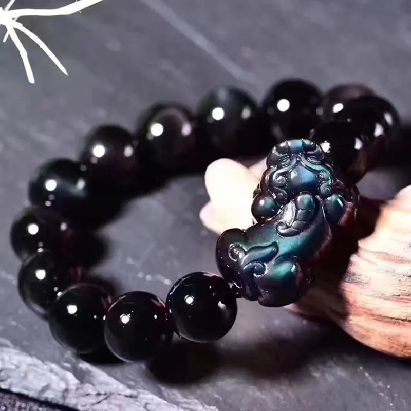 Natural ice colour eye obsidian crystal bracelet with measured beads on wrist