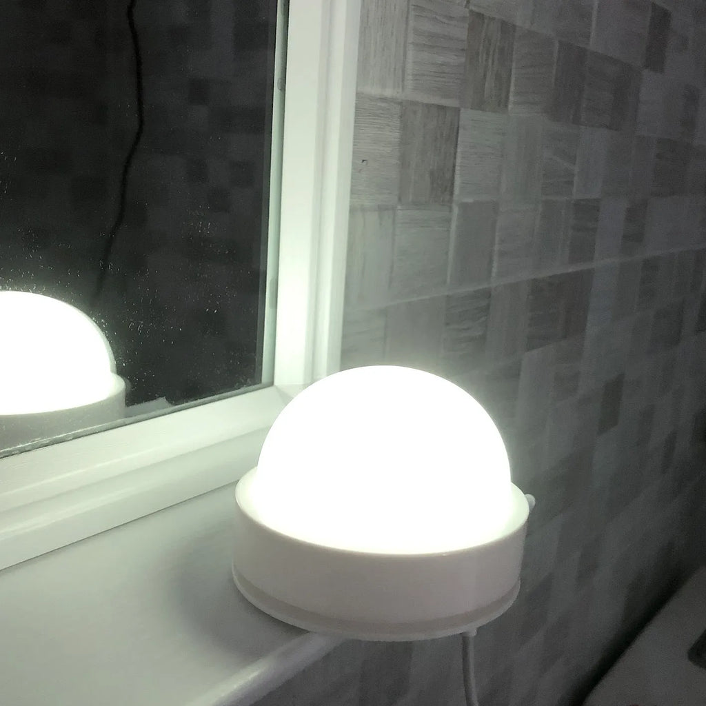 Shooting star night light with colourful gradient lighting showing touch and remote control functions