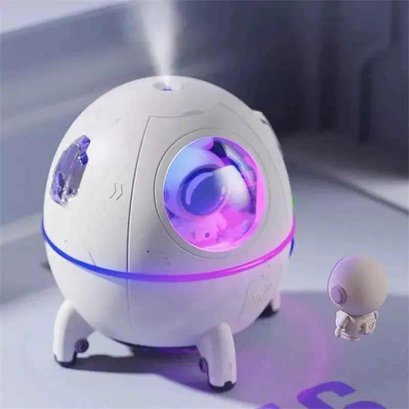 Light purple portable USB desktop humidifier with colourful LED light, 110mm size, on a desk