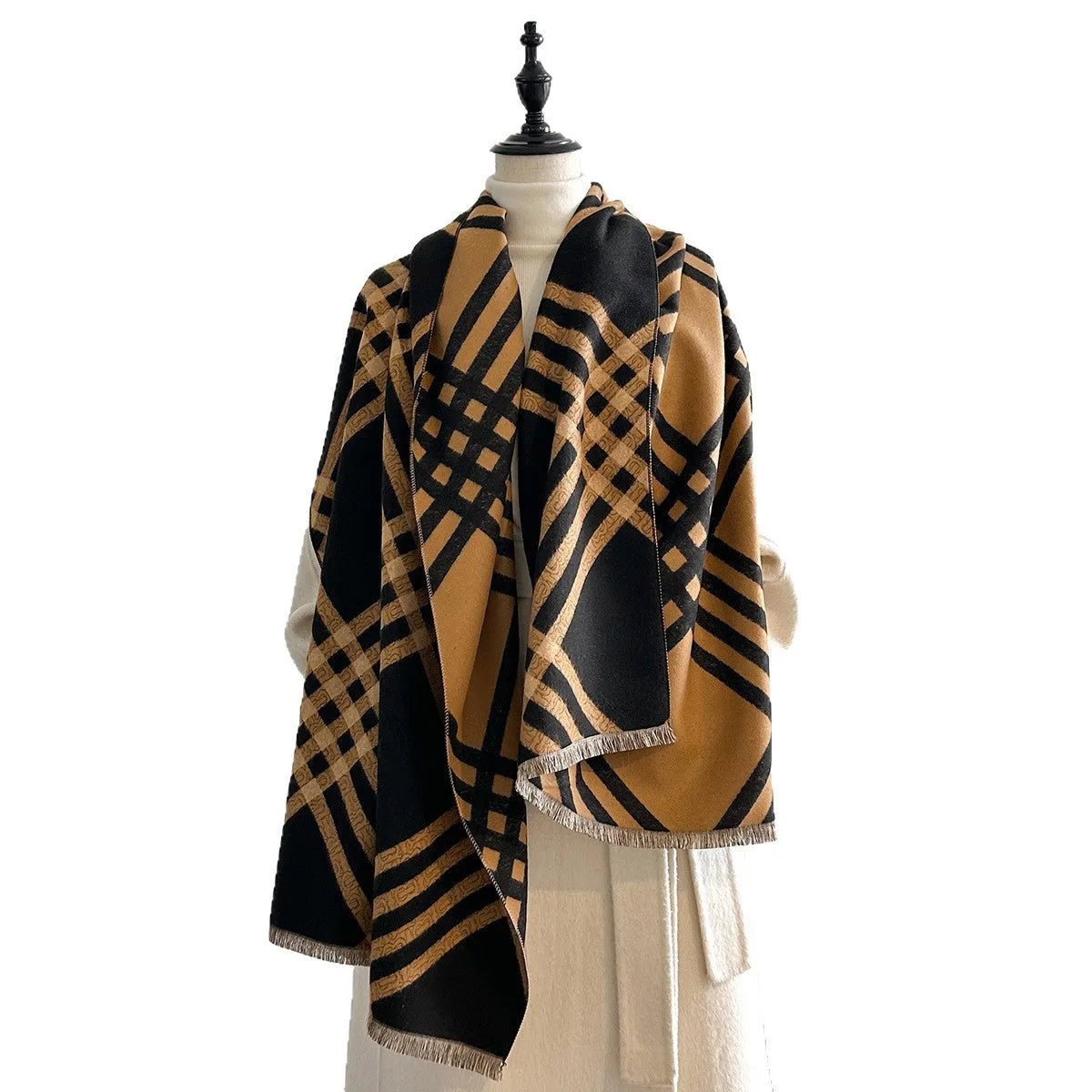 Cashmere-like scarf with tassel detailing in brown colour, showing 185x65cm dimensions