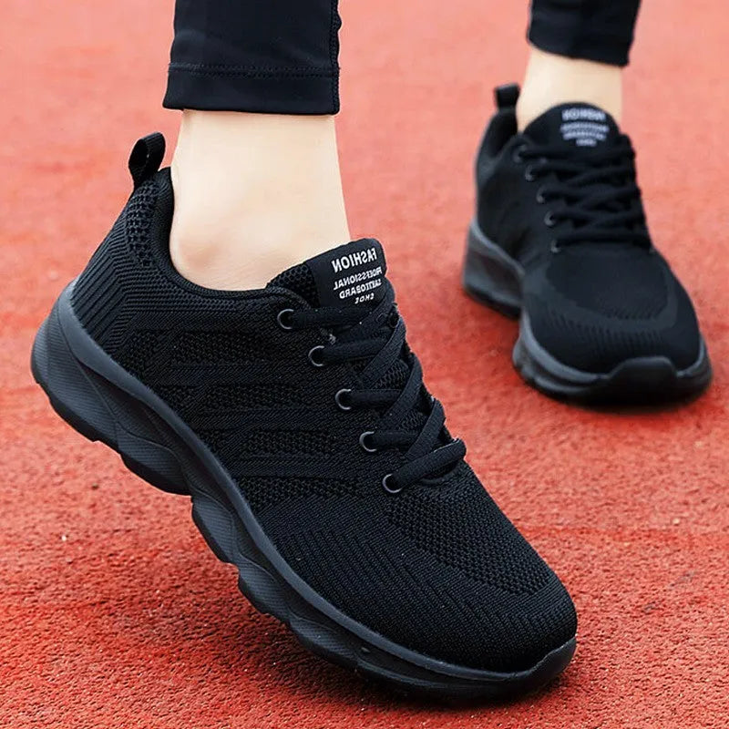 Women's white breathable mesh leisure shoes with lace-up front and round toe