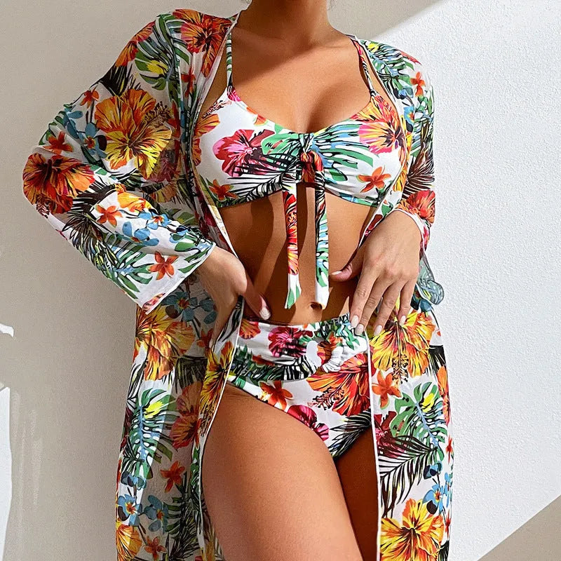 Women's long blouse style plus size bikini swimsuit in loose leisure fit on hanger.