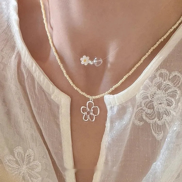 Women's hollow flower necklace with electroplated copper pendant and colourful beaded chain in Korean style
