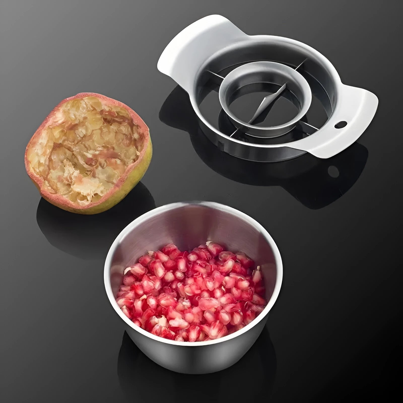 Stainless steel pomegranate fruit opener tool with wooden hammer and bowl for deseeding.