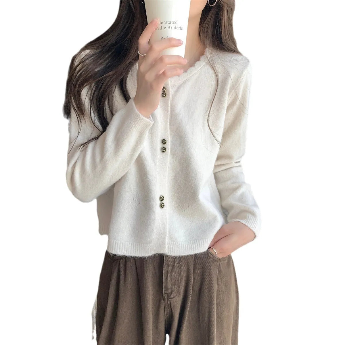 Women's long-sleeved acrylic cardigan coat in free size showing front opening and regular sleeve design