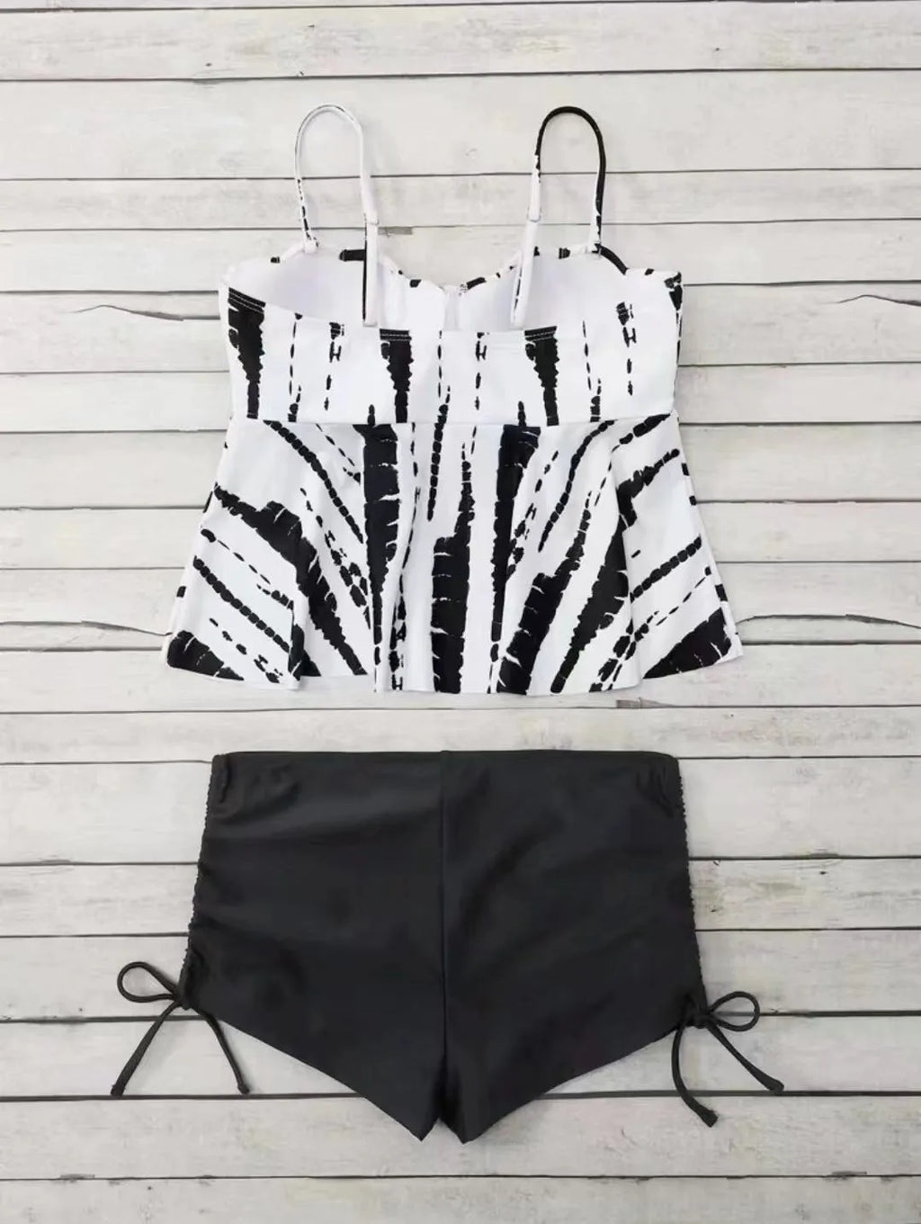 Women's printed bikini swimsuit with hard cups in blue, shown as a top and shorts set.