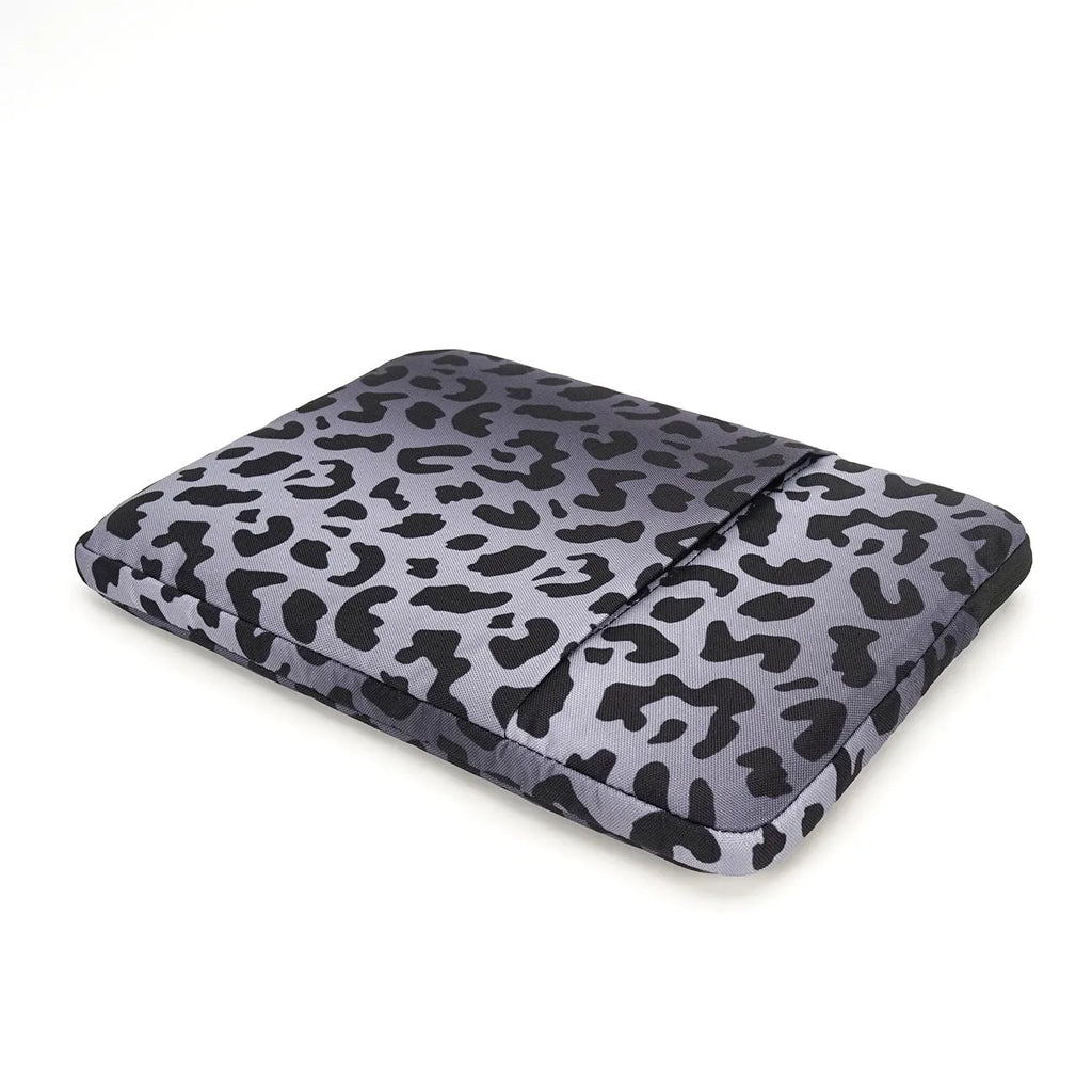 Leopard print laptop sleeve showing interior flannel lining, suitable for 13-inch to 16-inch devices with anti-shock protection