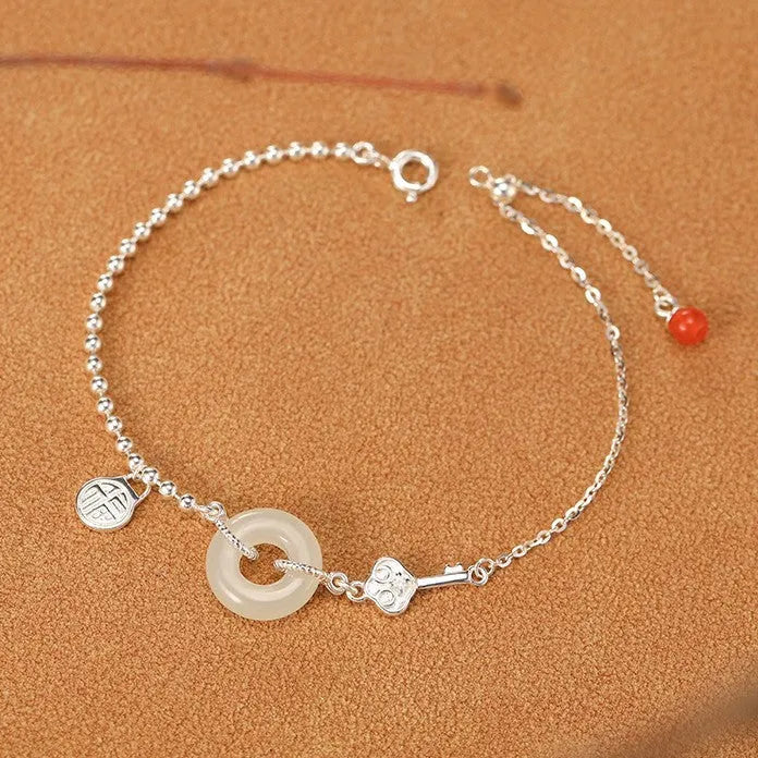 Women's 925 silver bracelet with Hetian jade elements in Chinese style geometry design