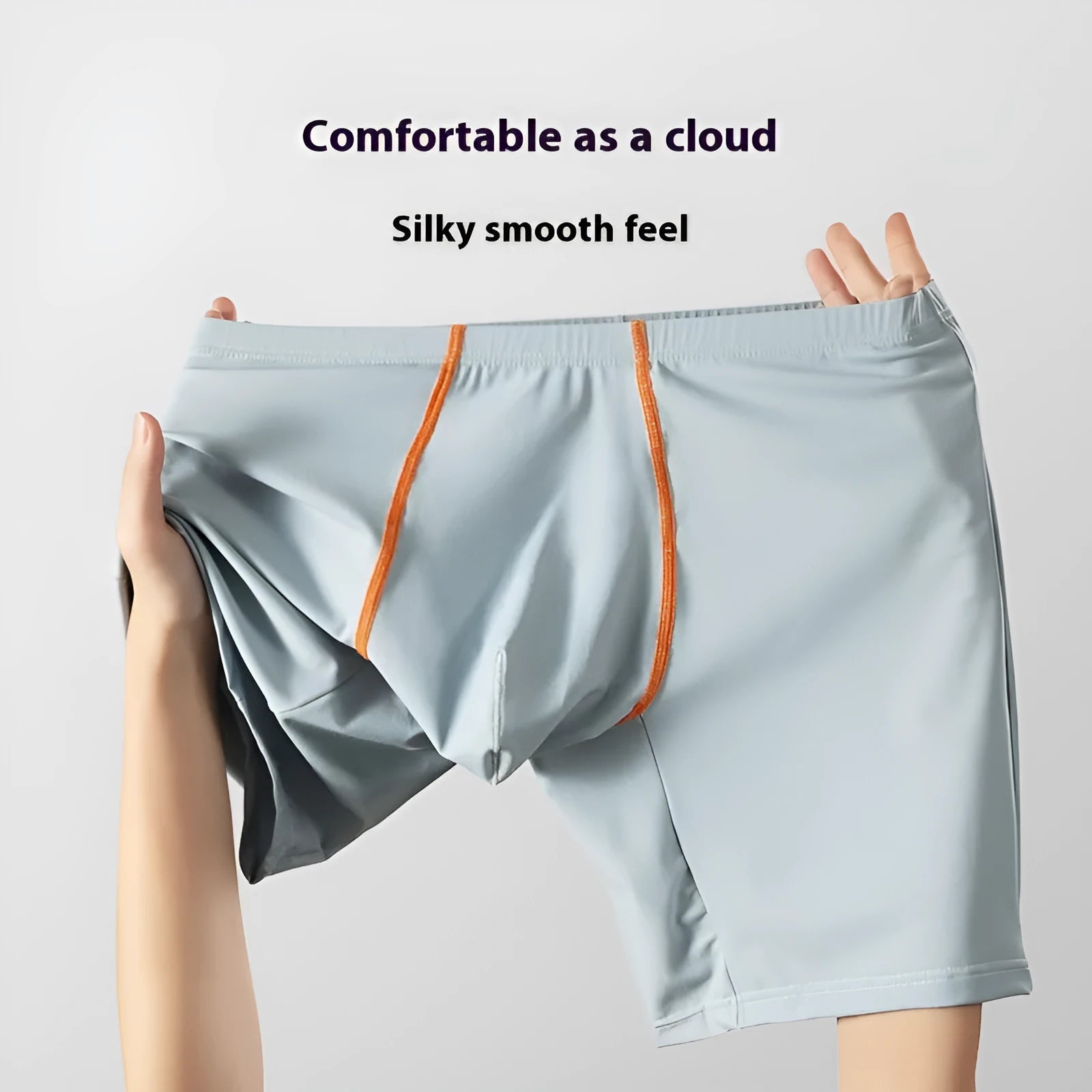 Men's mid-waist lengthened boxers in black ice silk nylon fabric on a white background.