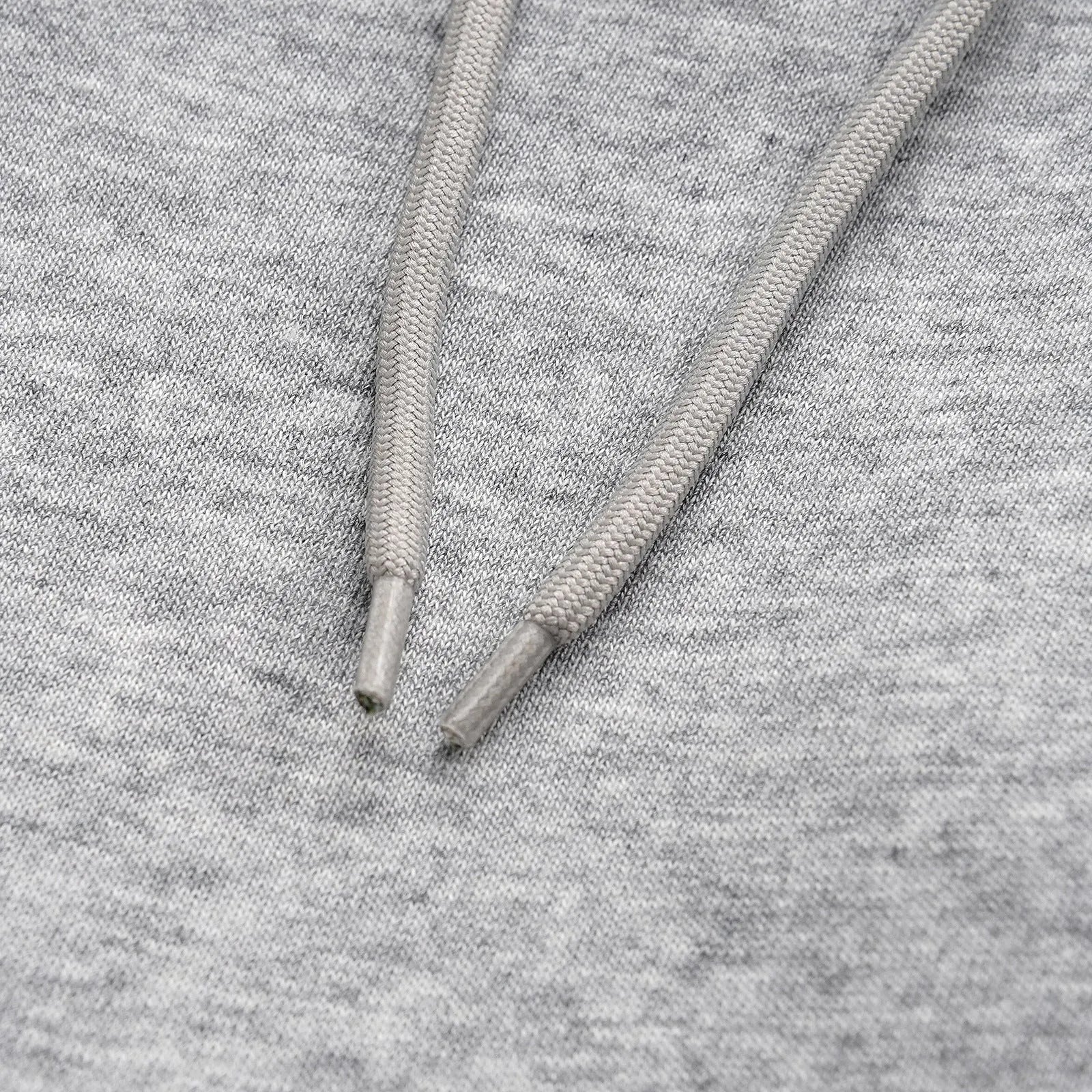 Men's grey straight-leg cotton trousers with elasticated waistband and loose casual fit