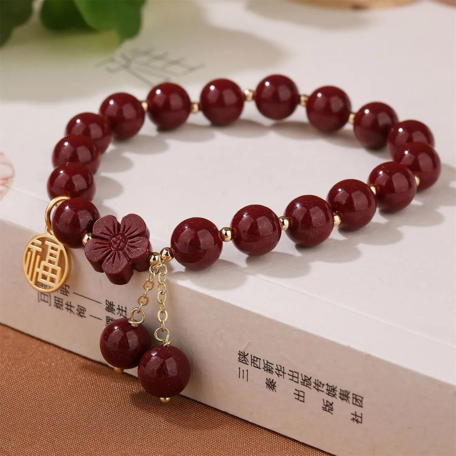 Women's purple gold sand cinnabar bracelet with fu character and peach blossom design on adjustable band
