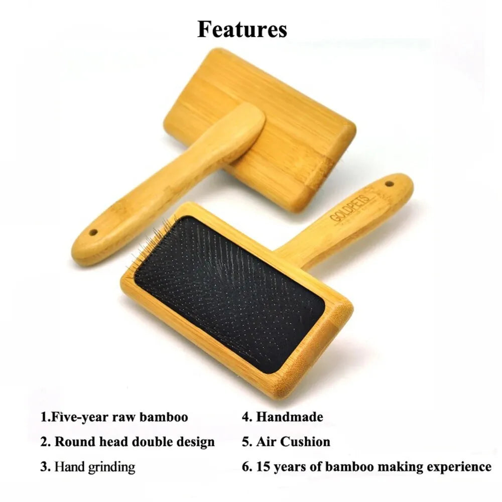 Goldpets bamboo wood pet slicker brush with stainless steel pins on a wooden table