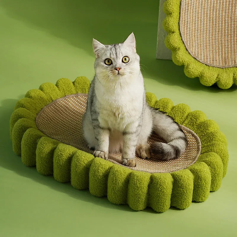 Green oval cat scratch pad bowl with sisal scratching surface measuring 65cm by 42cm
