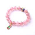 Pink strawberry quartz crystal bracelet with Chinese Ruyi symbols and hand-woven beaded design for women