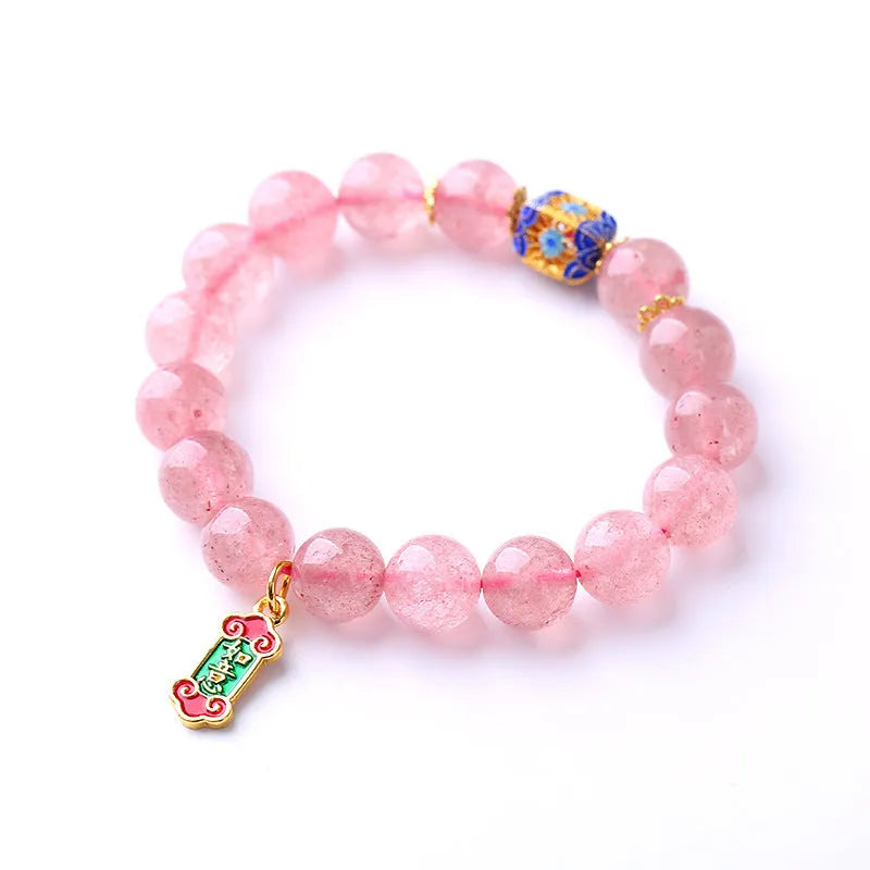 Pink strawberry quartz crystal bracelet with Chinese Ruyi symbols and hand-woven beaded design for women