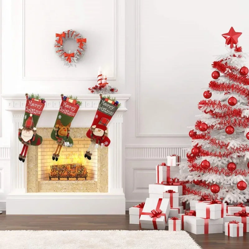 Three large Christmas stockings with Santa, Snowman, and Reindeer 3D applique designs in non-woven fabric