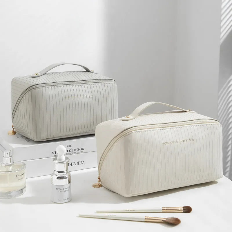 Vertical pattern cubic makeup bag in beige, black, brown, grey, or pink with 22.5cm dimensions
